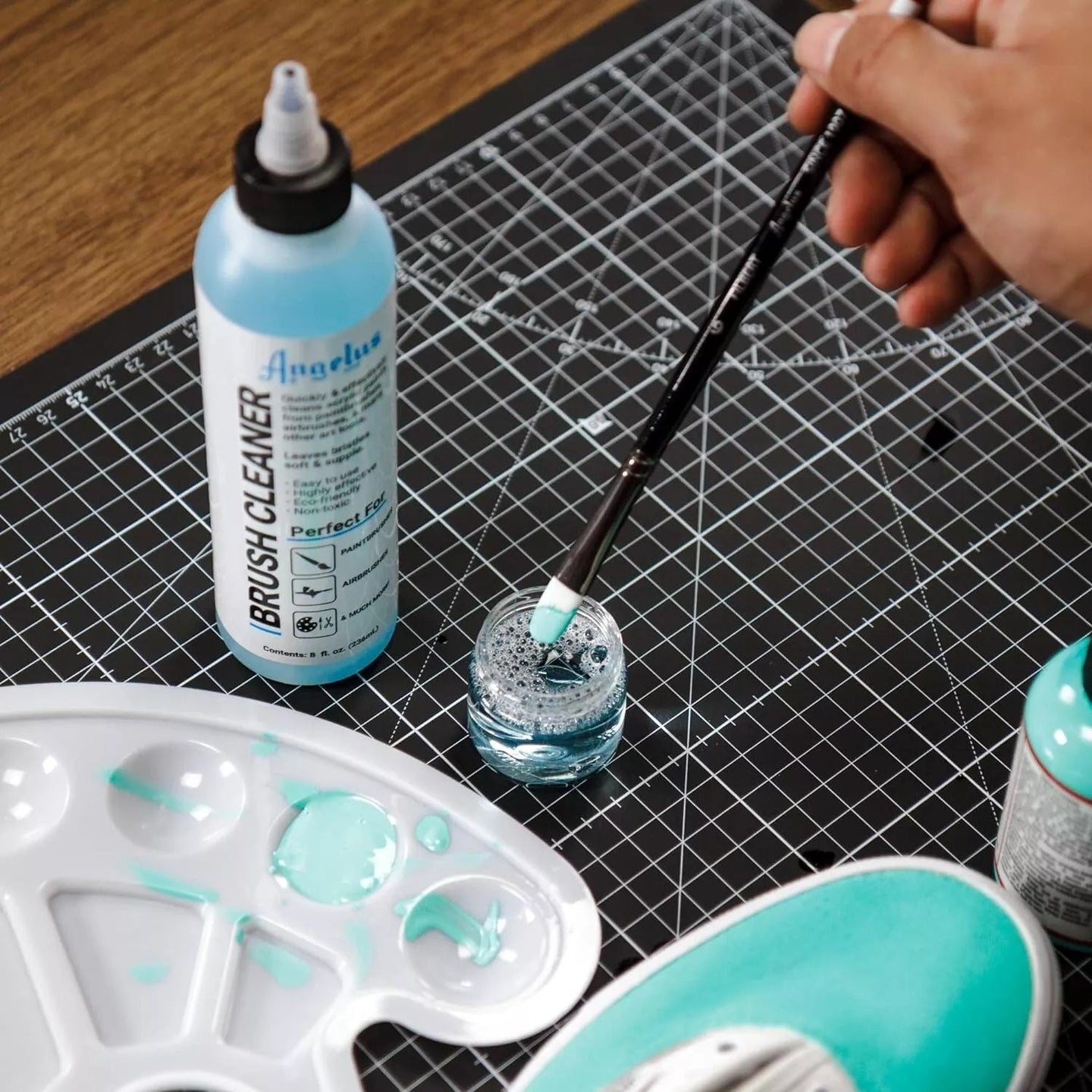 Angelus brush maintenance solution in a 236ml bottle designed for artists who regularly use acrylic paints and require precise tools