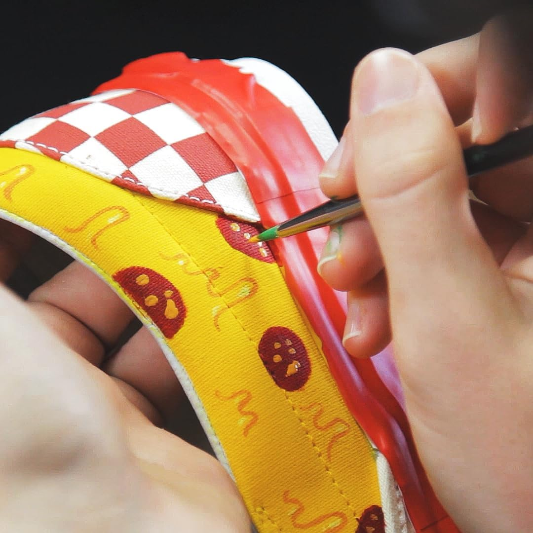 Professional acrylic paint maintaining crack-resistance on designer leather goods and premium accessories