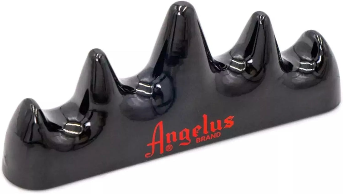 Professional workspace with Angelus brush holder keeping tools ready for creative painting work