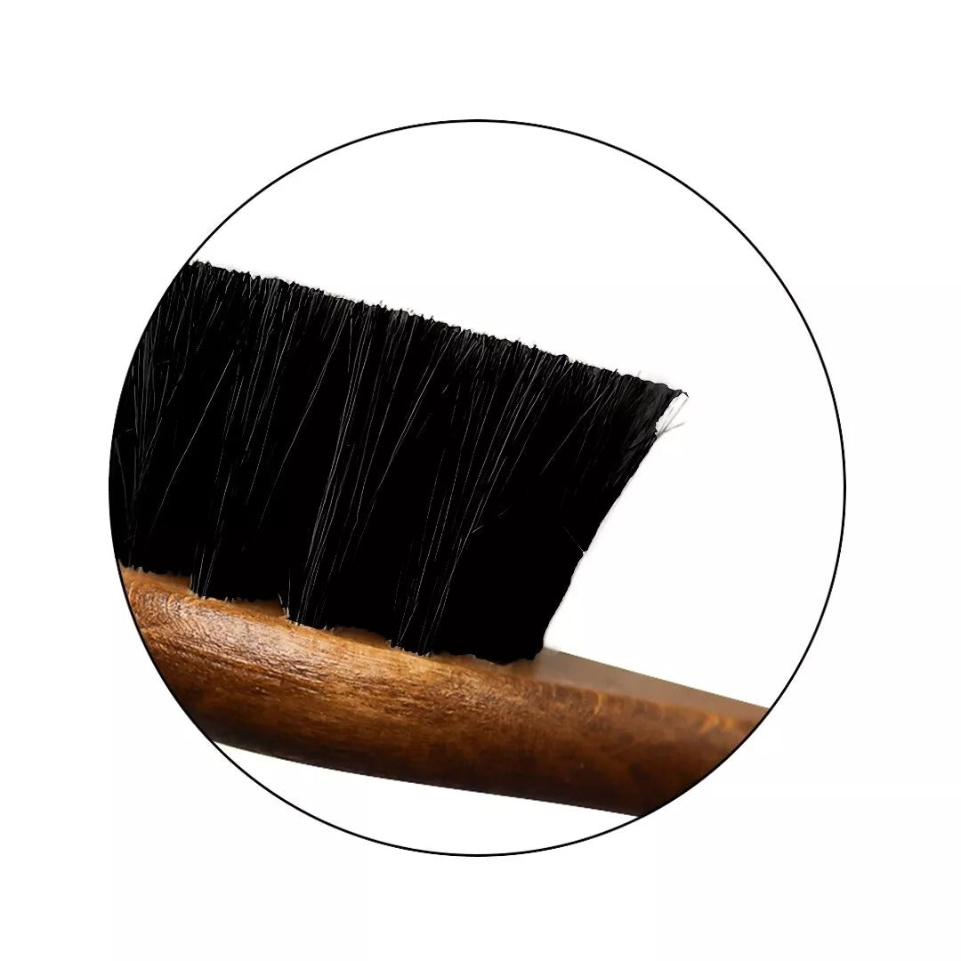 Horsehair dauber brush applying conditioner to hard-to-reach areas