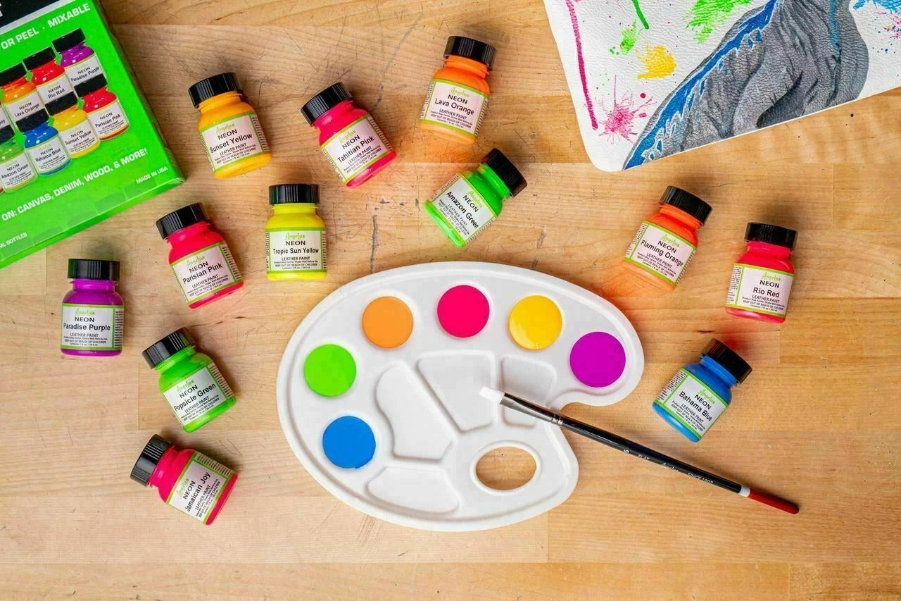 Using Angelus neon paints to create a bright glowing design on a sneaker perfect for festival wear and unique custom art