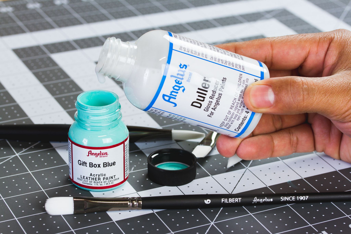 Finish comparison showing Angelus Duller modified paint creating flat matte versus original glossy surface