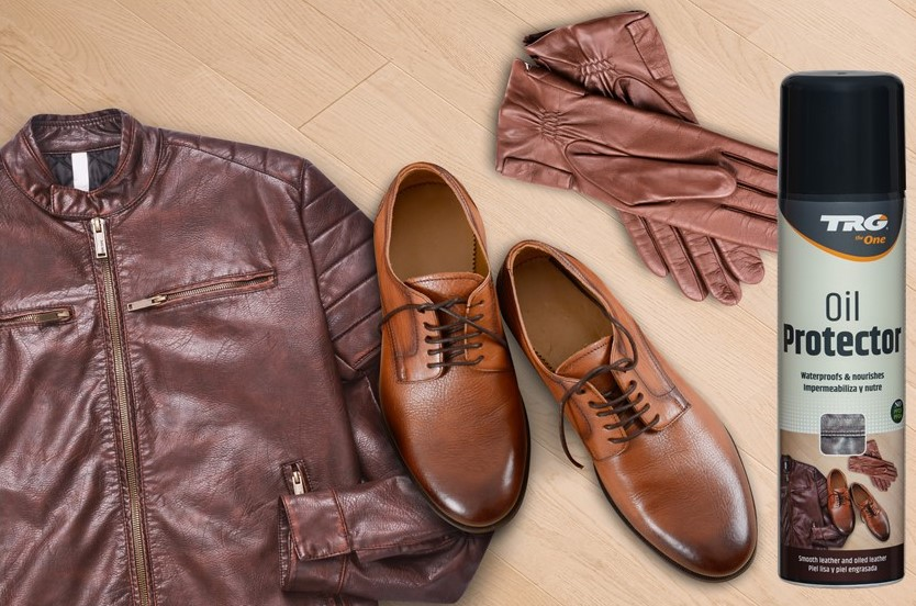 Applying TRG Oil Protector spray to prevent oil absorption and staining on work boots and casual shoes