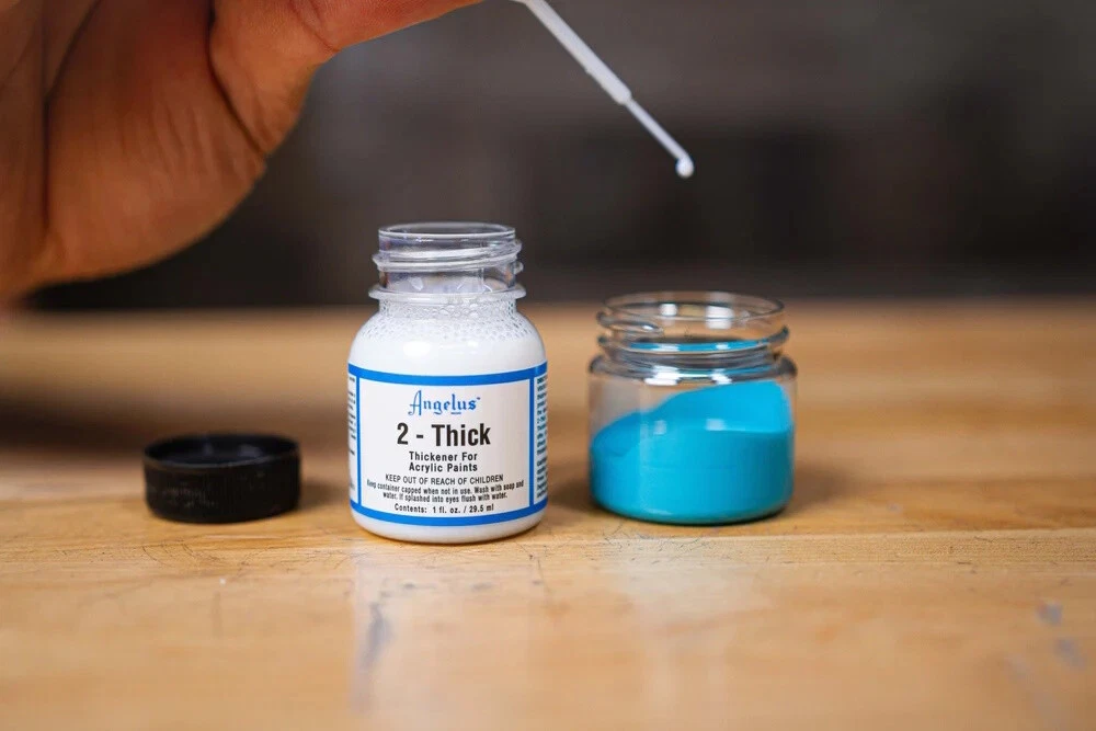 Texture demonstration showing Angelus 2-Thick modified paint holding sharp peaks for dimensional sneaker artwork