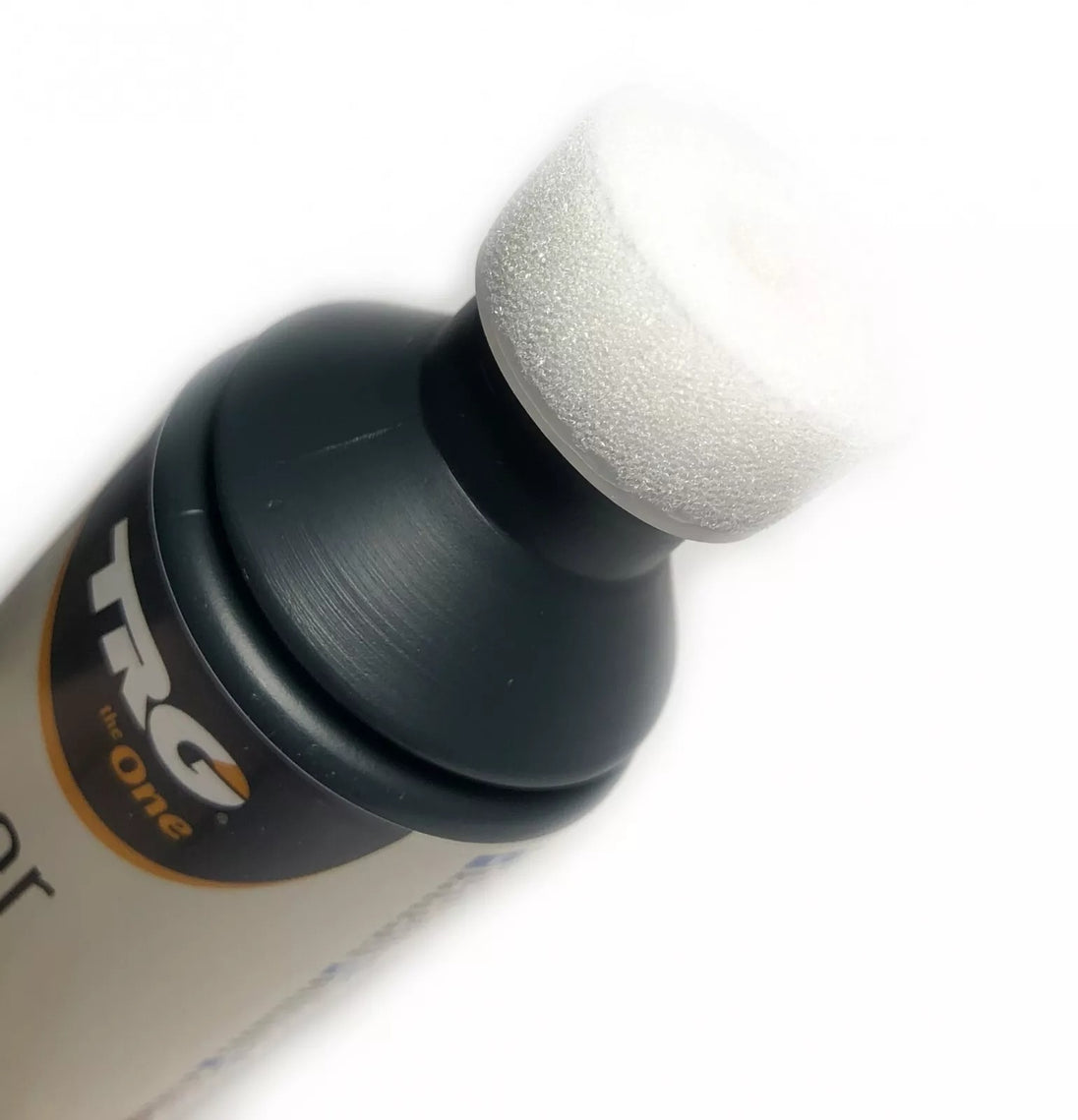 Applying TRG Superwhite to maintain brilliant whiteness on white dress shoes and athletic footwear