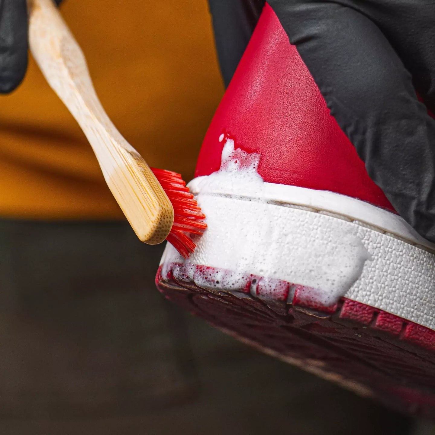 The two bamboo handle brushes from Angelus: a soft brush for delicate surfaces and a bristle brush for tough dirt on sneakers